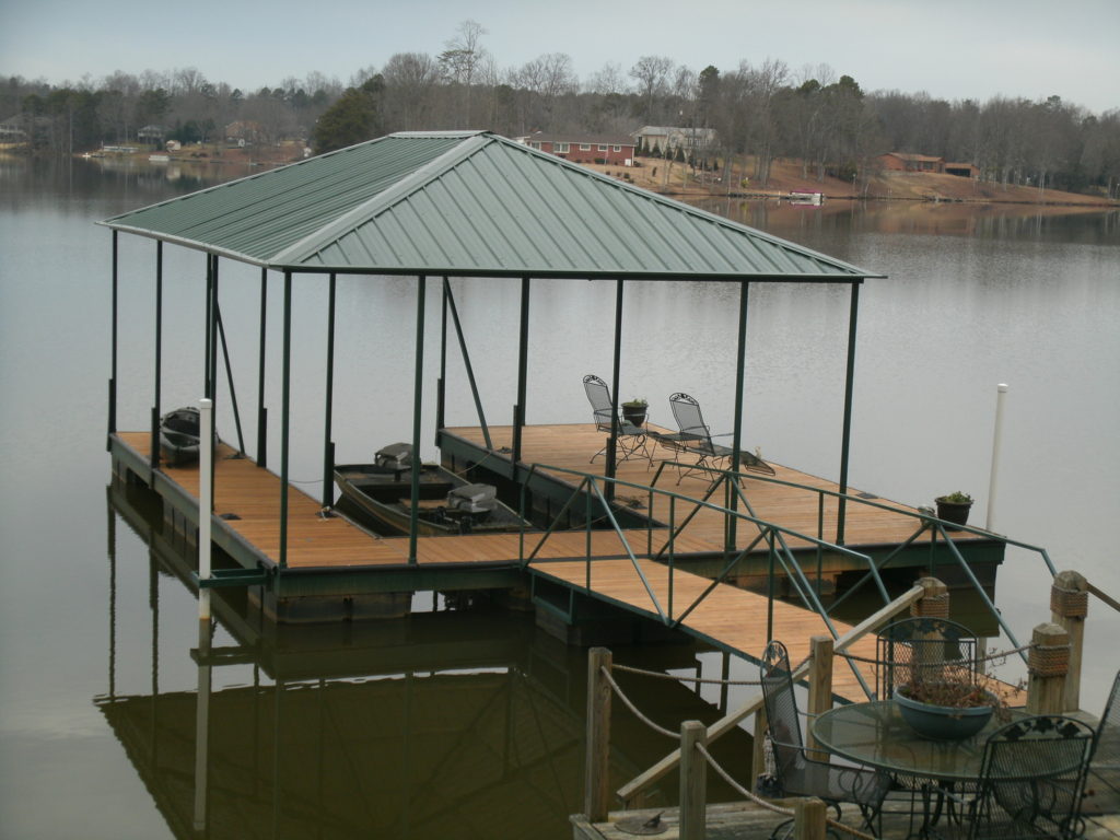 Lake Bowen Steel Floating Dock Painted Green with IPE Decking and Hip Roof.