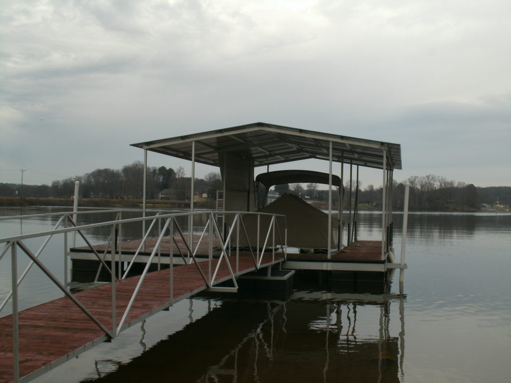 Lake Greenwood Steel Floating Dock with IPE decking and Gable Roof.
